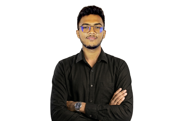 Young man with short hair and glasses, wearing a black button-up shirt and a wristwatch, arms crossed facing camera.