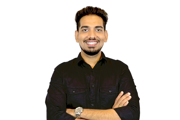 Portrait of a smiling man in a black button-down shirt with arms crossed.